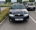 Черный Шкода Фабия, объемом двигателя 1.2 л и пробегом 260 тыс. км за 3700 $, фото 1 на Automoto.ua