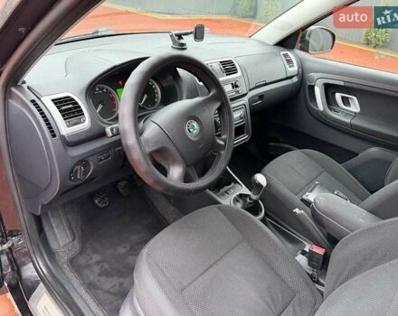 Черный Шкода Фабия, объемом двигателя 1.39 л и пробегом 209 тыс. км за 4800 $, фото 9 на Automoto.ua