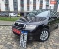 Чорний Шкода Фабія, об'ємом двигуна 1.4 л та пробігом 137 тис. км за 4750 $, фото 2 на Automoto.ua