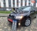 Чорний Шкода Фабія, об'ємом двигуна 1.4 л та пробігом 137 тис. км за 4750 $, фото 1 на Automoto.ua