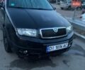 Черный Шкода Фабия, объемом двигателя 1.2 л и пробегом 278 тыс. км за 3300 $, фото 1 на Automoto.ua