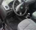 Черный Шкода Фабия, объемом двигателя 1.39 л и пробегом 228 тыс. км за 4000 $, фото 6 на Automoto.ua