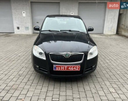 Черный Шкода Фабия, объемом двигателя 1.39 л и пробегом 215 тыс. км за 4790 $, фото 1 на Automoto.ua