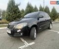 Черный Шкода Фабия, объемом двигателя 1.39 л и пробегом 234 тыс. км за 5000 $, фото 2 на Automoto.ua