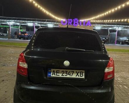 Черный Шкода Фабия, объемом двигателя 1.39 л и пробегом 185 тыс. км за 4500 $, фото 2 на Automoto.ua