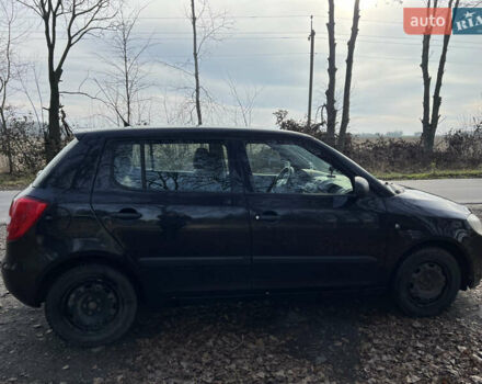 Черный Шкода Фабия, объемом двигателя 1.2 л и пробегом 272 тыс. км за 4200 $, фото 2 на Automoto.ua
