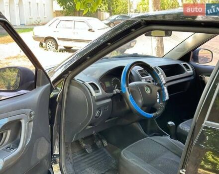Черный Шкода Фабия, объемом двигателя 1.4 л и пробегом 266 тыс. км за 4600 $, фото 5 на Automoto.ua