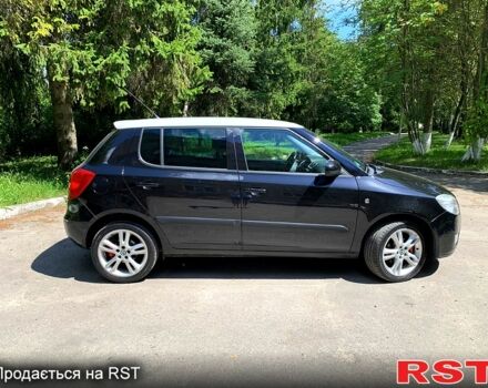 Черный Шкода Фабия, объемом двигателя 1.6 л и пробегом 206 тыс. км за 5600 $, фото 2 на Automoto.ua
