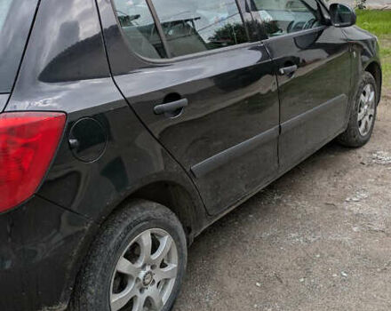 Черный Шкода Фабия, объемом двигателя 1.4 л и пробегом 255 тыс. км за 4600 $, фото 2 на Automoto.ua
