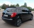 Черный Шкода Фабия, объемом двигателя 1.4 л и пробегом 168 тыс. км за 5600 $, фото 2 на Automoto.ua