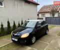 Черный Шкода Фабия, объемом двигателя 1.4 л и пробегом 250 тыс. км за 4000 $, фото 1 на Automoto.ua