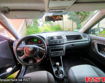 Черный Шкода Фабия, объемом двигателя 1.2 л и пробегом 128 тыс. км за 5770 $, фото 3 на Automoto.ua