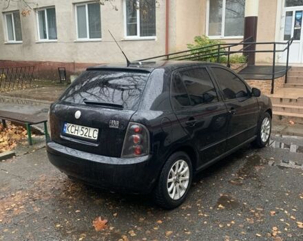 Черный Шкода Фабия, объемом двигателя 1.4 л и пробегом 210 тыс. км за 1600 $, фото 1 на Automoto.ua