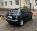 Черный Шкода Фабия, объемом двигателя 1.4 л и пробегом 210 тыс. км за 1600 $, фото 1 на Automoto.ua