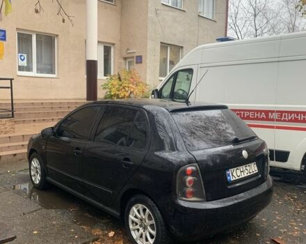Черный Шкода Фабия, объемом двигателя 1.4 л и пробегом 210 тыс. км за 1600 $, фото 2 на Automoto.ua