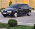 Черный Шкода Фабия, объемом двигателя 1.39 л и пробегом 198 тыс. км за 3950 $, фото 1 на Automoto.ua