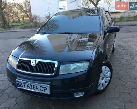 Черный Шкода Фабия, объемом двигателя 1.4 л и пробегом 203 тыс. км за 4100 $, фото 2 на Automoto.ua