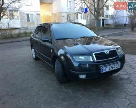 Черный Шкода Фабия, объемом двигателя 1.4 л и пробегом 203 тыс. км за 4100 $, фото 1 на Automoto.ua