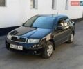 Черный Шкода Фабия, объемом двигателя 1.2 л и пробегом 164 тыс. км за 2500 $, фото 1 на Automoto.ua
