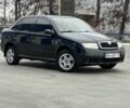 Черный Шкода Фабия, объемом двигателя 1.2 л и пробегом 200 тыс. км за 3100 $, фото 1 на Automoto.ua