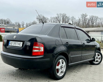 Черный Шкода Фабия, объемом двигателя 1.4 л и пробегом 234 тыс. км за 3700 $, фото 4 на Automoto.ua