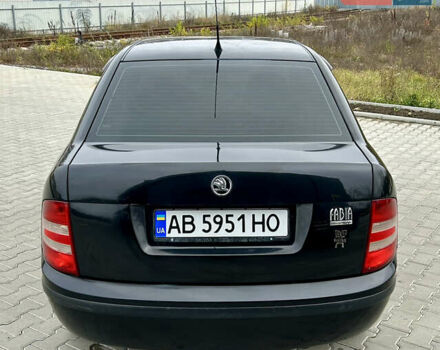 Черный Шкода Фабия, объемом двигателя 1.4 л и пробегом 234 тыс. км за 3700 $, фото 5 на Automoto.ua