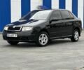 Черный Шкода Фабия, объемом двигателя 1.2 л и пробегом 200 тыс. км за 3100 $, фото 1 на Automoto.ua