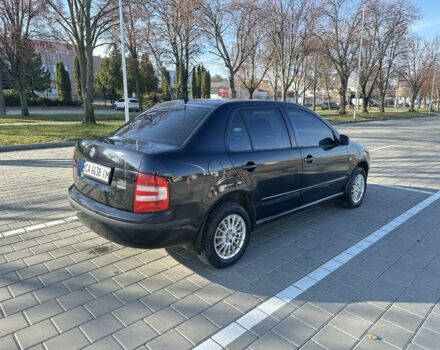 Черный Шкода Фабия, объемом двигателя 1.2 л и пробегом 285 тыс. км за 4200 $, фото 1 на Automoto.ua