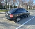 Черный Шкода Фабия, объемом двигателя 1.2 л и пробегом 285 тыс. км за 4200 $, фото 1 на Automoto.ua