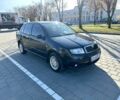 Черный Шкода Фабия, объемом двигателя 1.2 л и пробегом 285 тыс. км за 4200 $, фото 1 на Automoto.ua