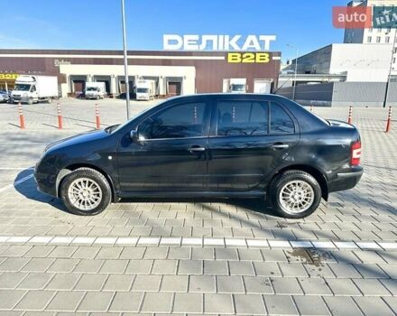 Чорний Шкода Фабія, об'ємом двигуна 1.2 л та пробігом 285 тис. км за 4200 $, фото 4 на Automoto.ua