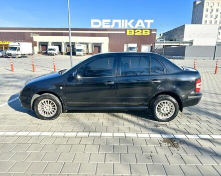 Черный Шкода Фабия, объемом двигателя 1.2 л и пробегом 285 тыс. км за 4200 $, фото 5 на Automoto.ua