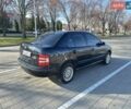 Черный Шкода Фабия, объемом двигателя 1.2 л и пробегом 285 тыс. км за 3600 $, фото 1 на Automoto.ua