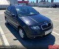 Черный Шкода Фабия, объемом двигателя 1.4 л и пробегом 120 тыс. км за 4000 $, фото 1 на Automoto.ua