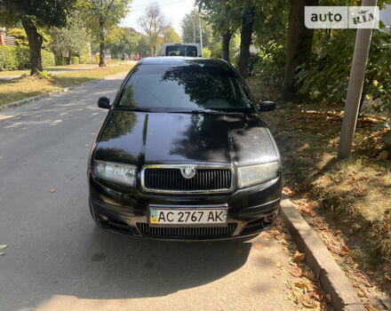 Черный Шкода Фабия, объемом двигателя 1.2 л и пробегом 210 тыс. км за 3600 $, фото 1 на Automoto.ua