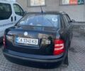 Черный Шкода Фабия, объемом двигателя 1.2 л и пробегом 244 тыс. км за 3500 $, фото 1 на Automoto.ua