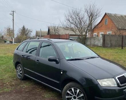 Черный Шкода Фабия, объемом двигателя 1.39 л и пробегом 278 тыс. км за 4200 $, фото 1 на Automoto.ua