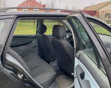 Черный Шкода Фабия, объемом двигателя 1.39 л и пробегом 278 тыс. км за 4200 $, фото 2 на Automoto.ua