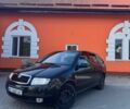 Черный Шкода Фабия, объемом двигателя 1.4 л и пробегом 255 тыс. км за 3250 $, фото 1 на Automoto.ua