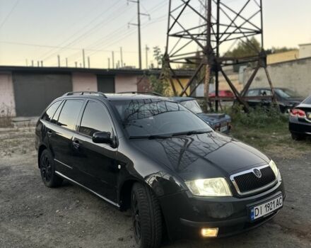 Черный Шкода Фабия, объемом двигателя 1.4 л и пробегом 290 тыс. км за 4400 $, фото 2 на Automoto.ua