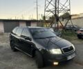 Черный Шкода Фабия, объемом двигателя 1.4 л и пробегом 290 тыс. км за 4400 $, фото 2 на Automoto.ua