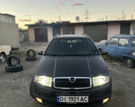 Черный Шкода Фабия, объемом двигателя 1.4 л и пробегом 290 тыс. км за 4400 $, фото 1 на Automoto.ua