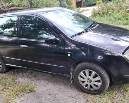 Черный Шкода Фабия, объемом двигателя 1.4 л и пробегом 153 тыс. км за 3100 $, фото 1 на Automoto.ua