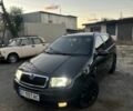 Черный Шкода Фабия, объемом двигателя 1.4 л и пробегом 290 тыс. км за 4400 $, фото 1 на Automoto.ua