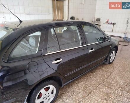 Черный Шкода Фабия, объемом двигателя 1.4 л и пробегом 213 тыс. км за 3999 $, фото 7 на Automoto.ua