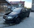 Черный Шкода Фабия, объемом двигателя 1.2 л и пробегом 290 тыс. км за 2500 $, фото 1 на Automoto.ua