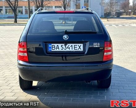 Черный Шкода Фабия, объемом двигателя 1.4 л и пробегом 237 тыс. км за 4200 $, фото 4 на Automoto.ua