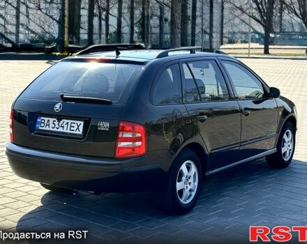 Черный Шкода Фабия, объемом двигателя 1.4 л и пробегом 237 тыс. км за 4200 $, фото 5 на Automoto.ua