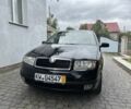 Черный Шкода Фабия, объемом двигателя 1.4 л и пробегом 174 тыс. км за 4899 $, фото 1 на Automoto.ua