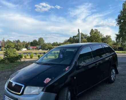 Черный Шкода Фабия, объемом двигателя 1.2 л и пробегом 210 тыс. км за 1500 $, фото 1 на Automoto.ua